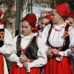 girls wearing traditional costumes